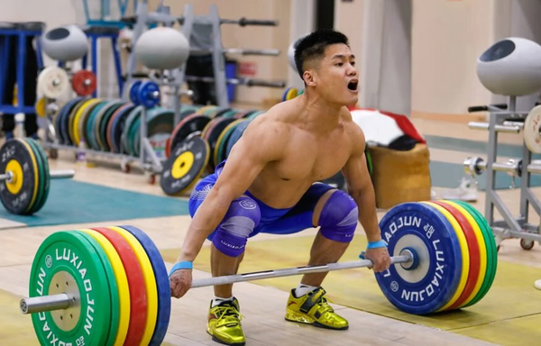 Lu Xiaojun: The Weightlifter Behind the Brand